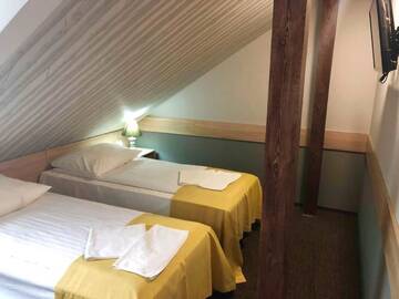 Фото номера Двухместный номер Делюкс с 1 кроватью Отель Hotel Mużakowski г. Ленкница 2